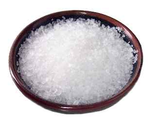 image of white salt crystals in small saucer
