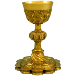 Photo of an antique looking ornate golden chalice with a decorative base.
